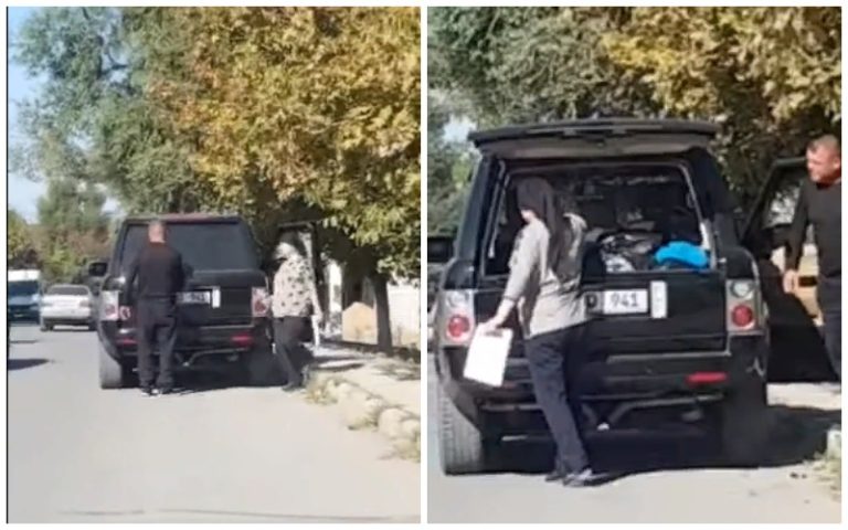 (ВИДЕО) Дудогло обвиняет «команду оппонентов» в подкупе избирателей. На видео Анна Братунова несет пакет к дому избирателей