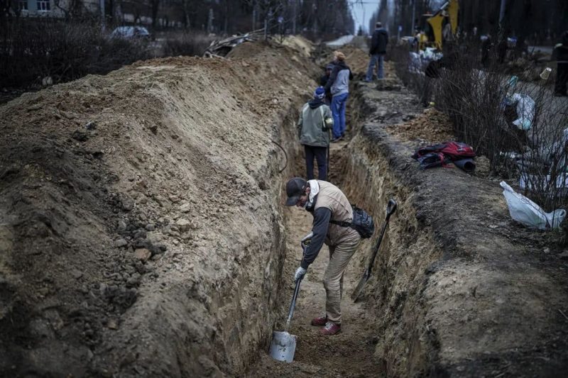 общие могилы в Украине