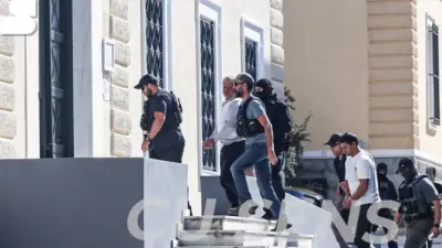 владимир плахотнюк у суда в греции