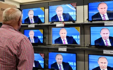 путин в телевизорах