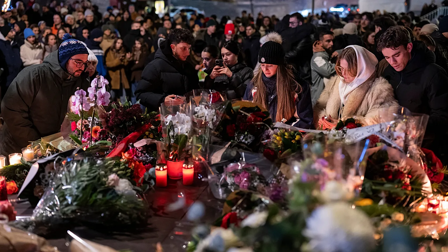 Люди скорбят по погибшим в пожаре в Швейцарии